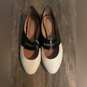 Jeffery Campbell patent, leather, black, and white slip Ons